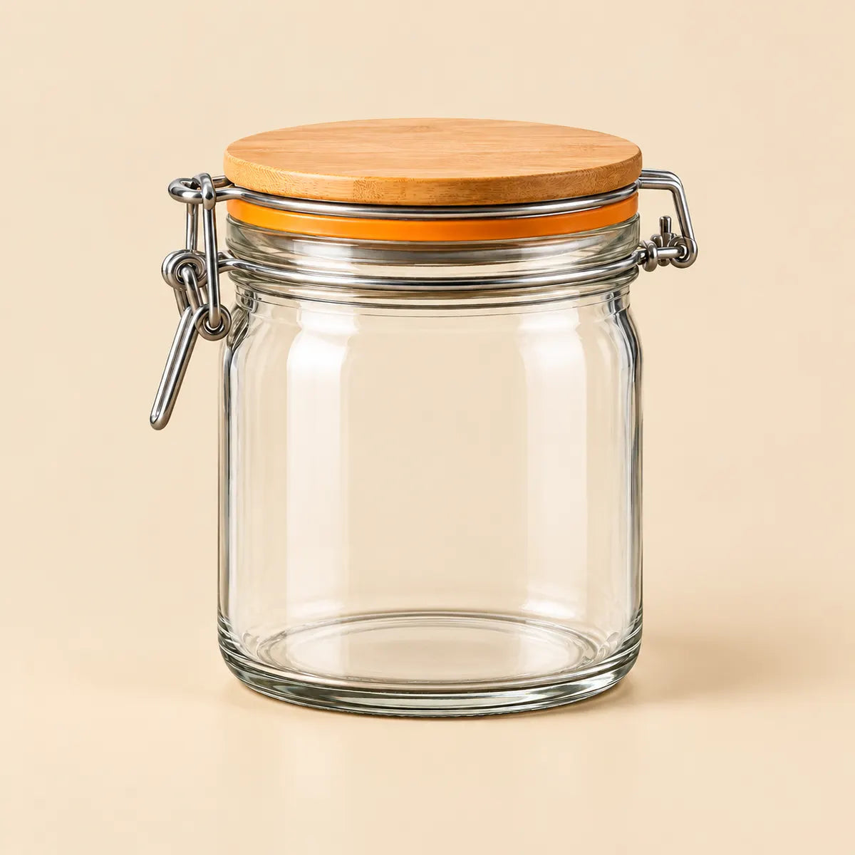 Verdelique glass storage jar with wood-toned lid and orange gasket on an apricot background
